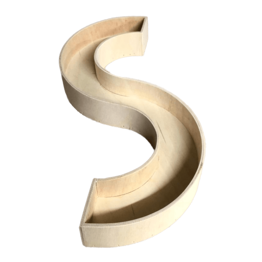 Custom wood products in the shape of an 'S' made from smooth plywood.