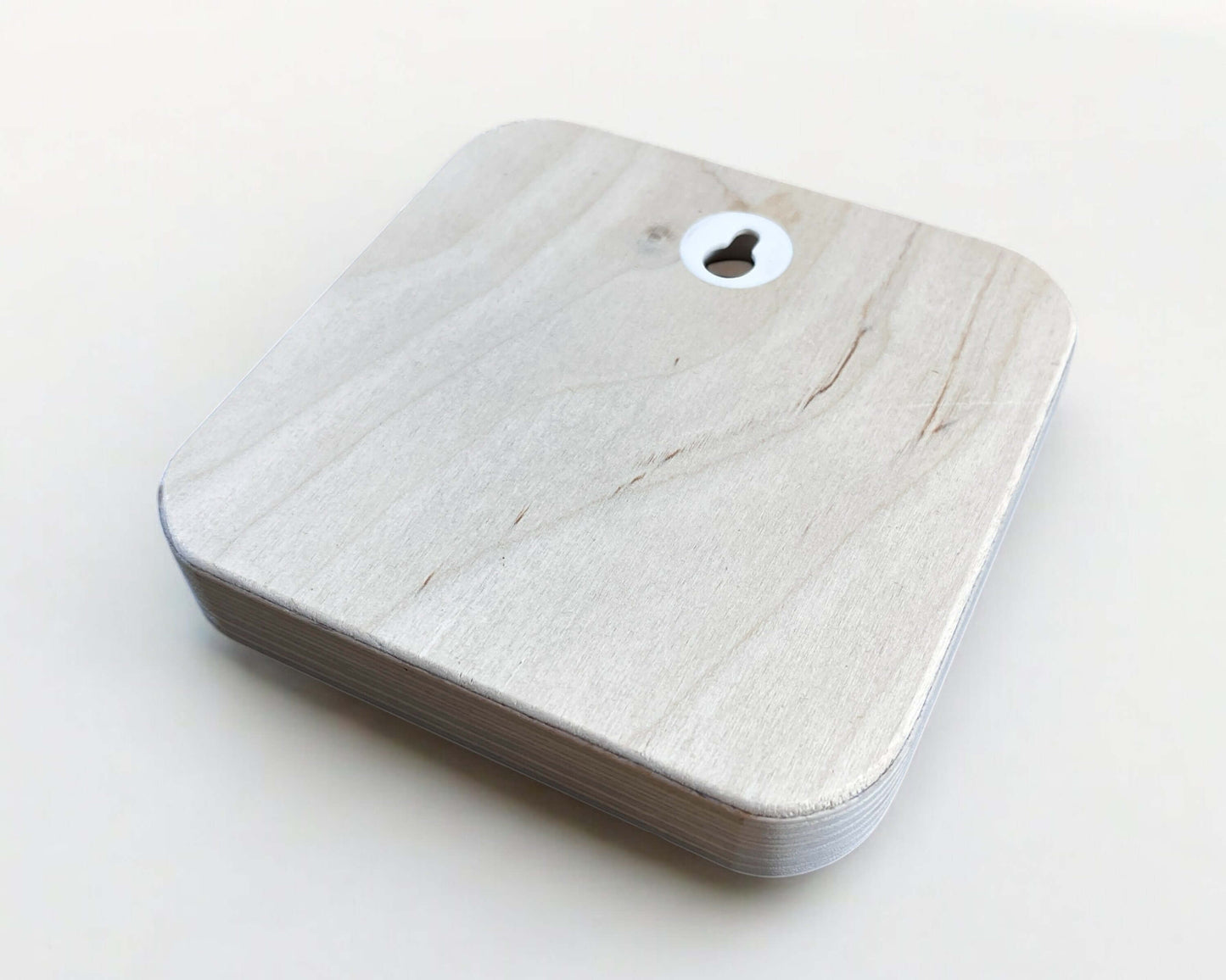 Photo on plywood - 12x12cm product showing the back of the birch plywood with a hanging hook.