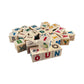 Wooden letter blocks - estonian alphabet - 30 pcs arranged in a playful pile with letters and images.