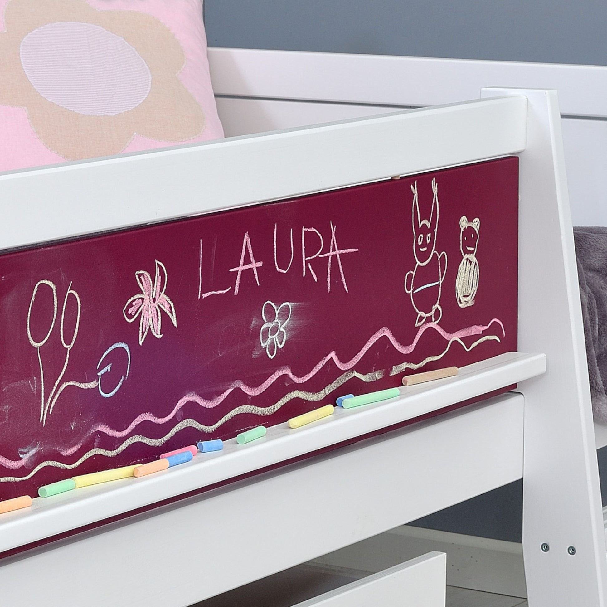 Jerwen - Compact-bed with blackboard, ladder and slide - 90x200 cm featuring colorful chalk drawings.