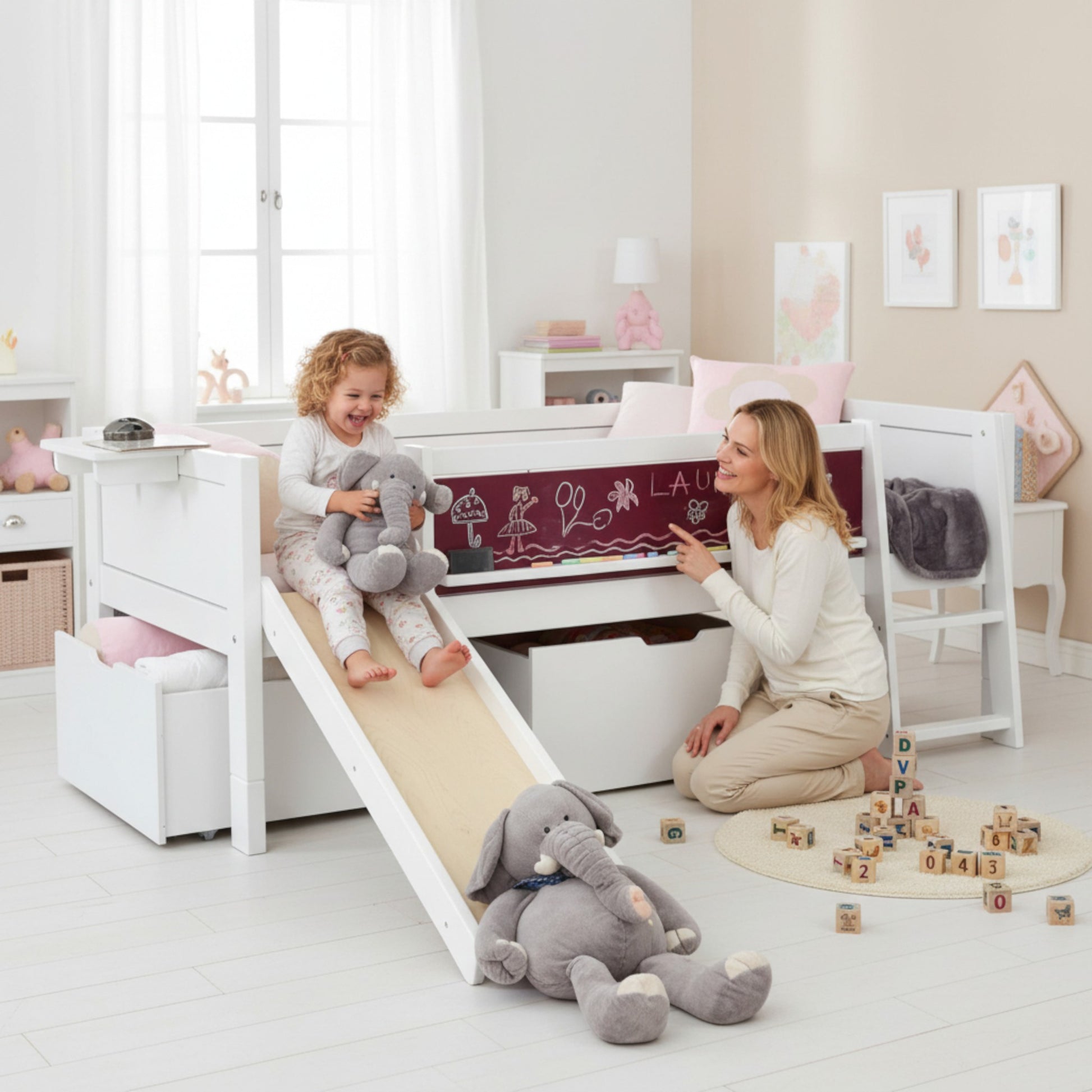 Jerwen - Compact-bed with blackboard, ladder and slide - 90x200 cm in a playful bedroom setting.
