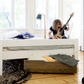 Lahe - Bed - 140x200 cm - White with a musician playing bass and stylish interior decor.
