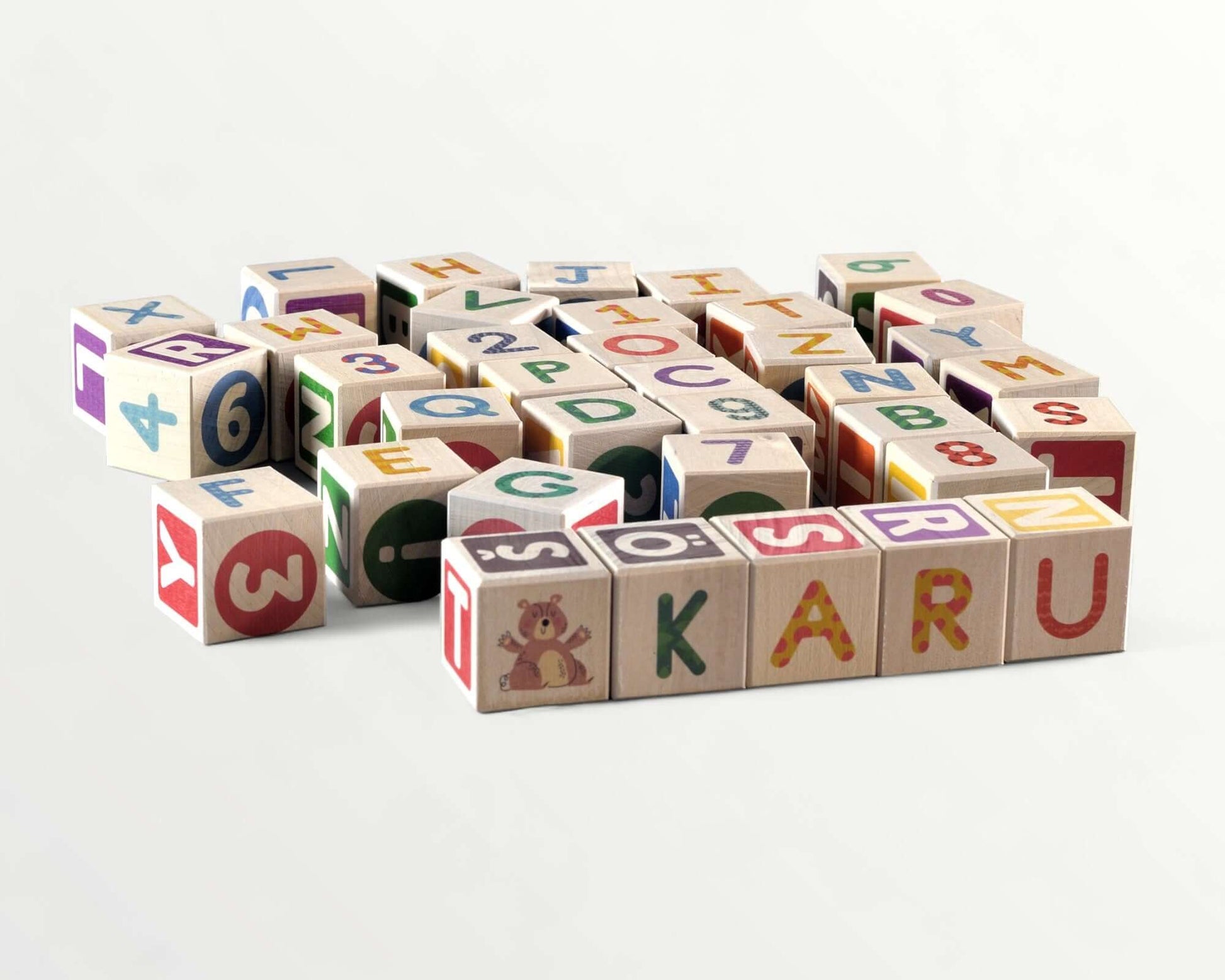 ABC-123 Wooden blocks - 36 pcs in a colorful arrangement featuring numbers and letters.