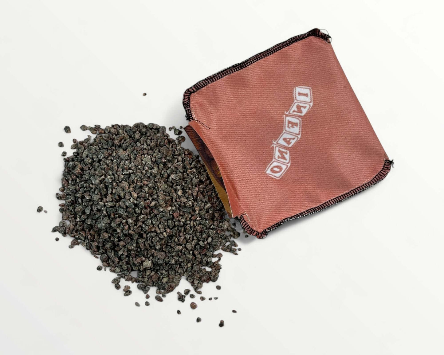 Cornhole Bags – Set of 4 with fine granite sand filling spilling out.