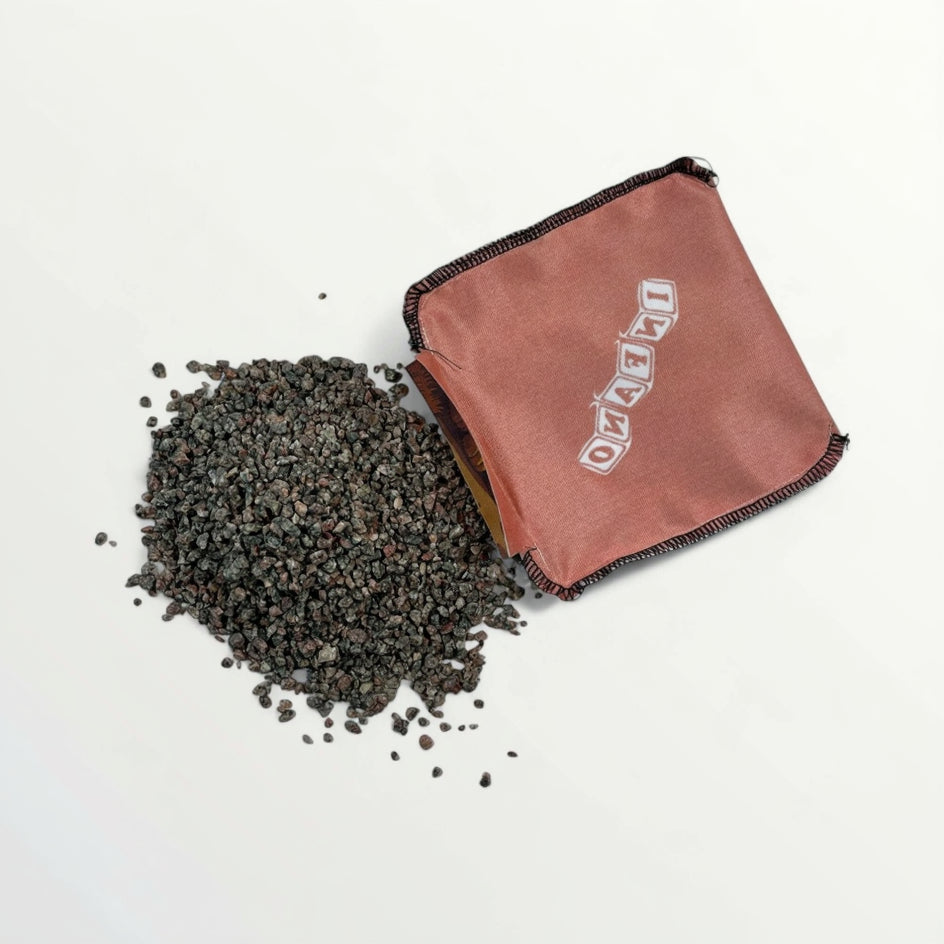 Cornhole Bags – Set of 4, showing a bag and fine granite sand for durable throwing.