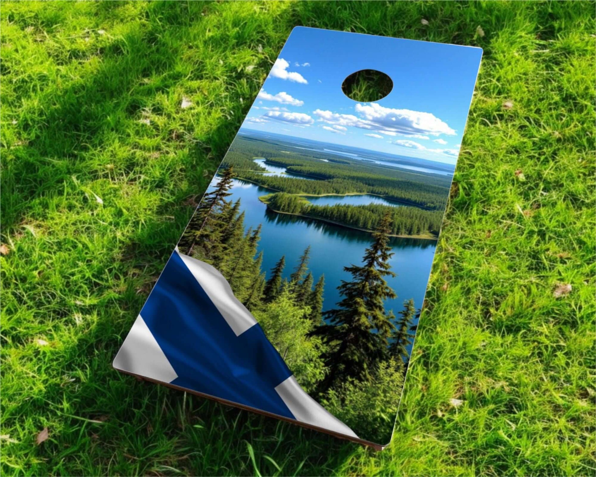 Cornhole Board - 120x60 cm displayed on grass with a scenic landscape design featuring lakes and forests.