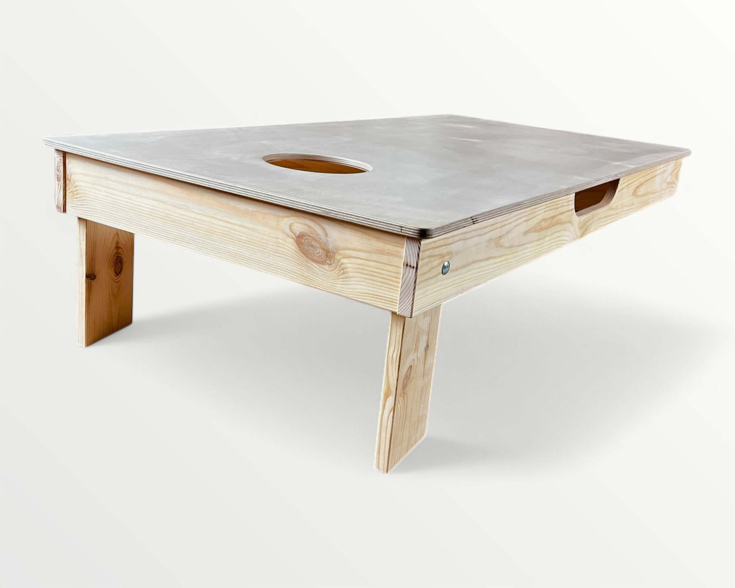 Cornhole Board - 120x60 cm with wood legs and slanted design for tossing bags.