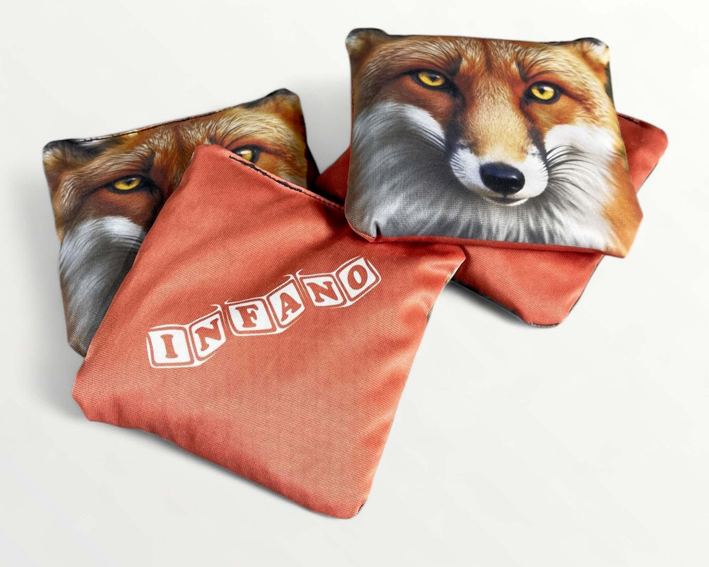Cornhole Bags – Set of 4 featuring colorful designs, including a fox face and personalized logo options.