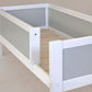 Infano Jerwen junior bed in white and grey birch wood with a front safety barrier and solid wood bed base
