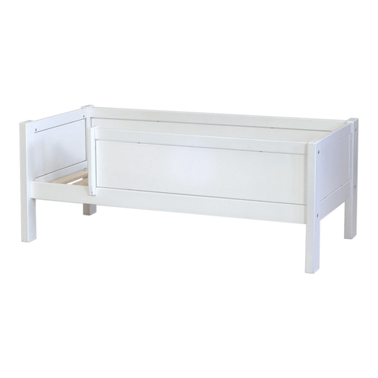 Infano Jerwen white junior bed made of solid birch wood with a protective safety barrier for children
