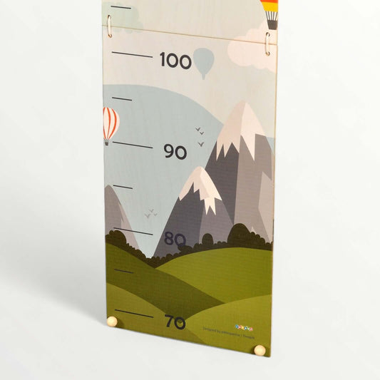 Kids measuring stick displaying height measurement from 70 cm to 100 cm with a colorful mountain design.