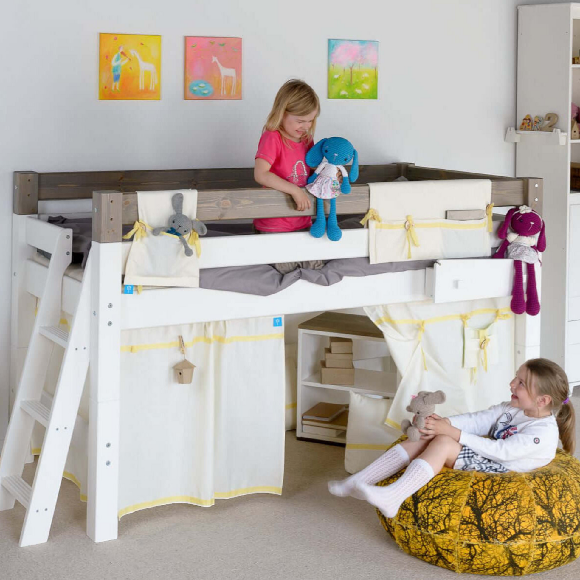 Lahe - Half high bed with slant ladder end mount - 90x200 cm - White in a children's room with kids playing.