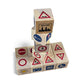 Stack of wooden blocks with road sign designs on a white background