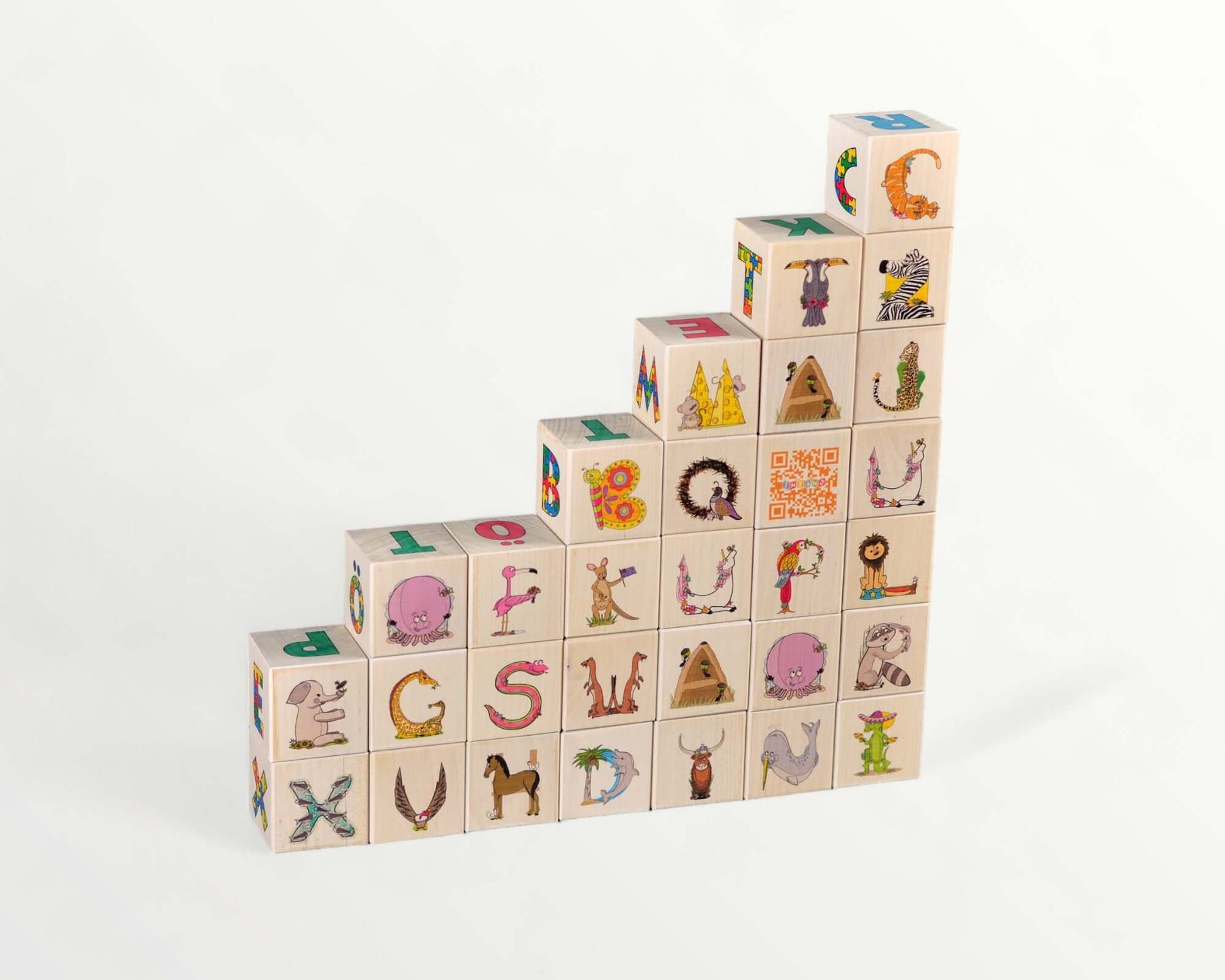 Wooden letter blocks - finnish alphabet - 30 pcs arranged in a staircase pattern, featuring colorful images and letters.