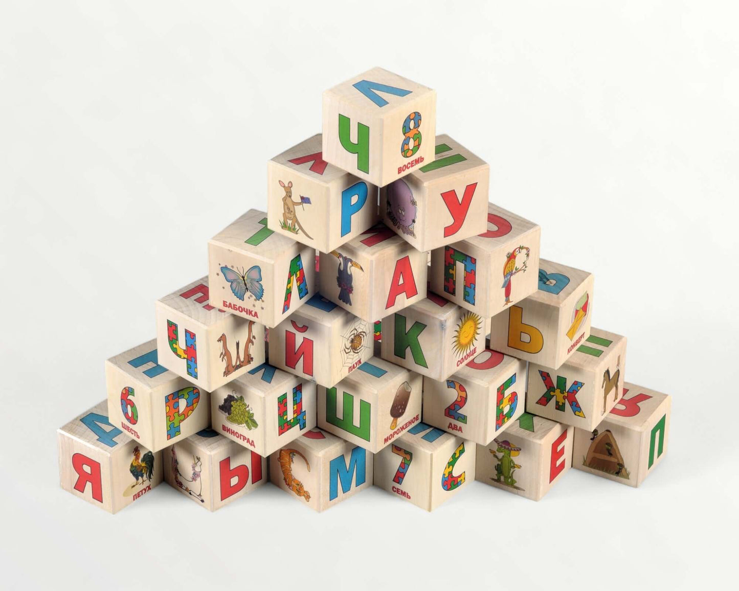 Wooden letter blocks - russian alphabet - 30 pcs displayed in a pyramid with colorful images and letters.