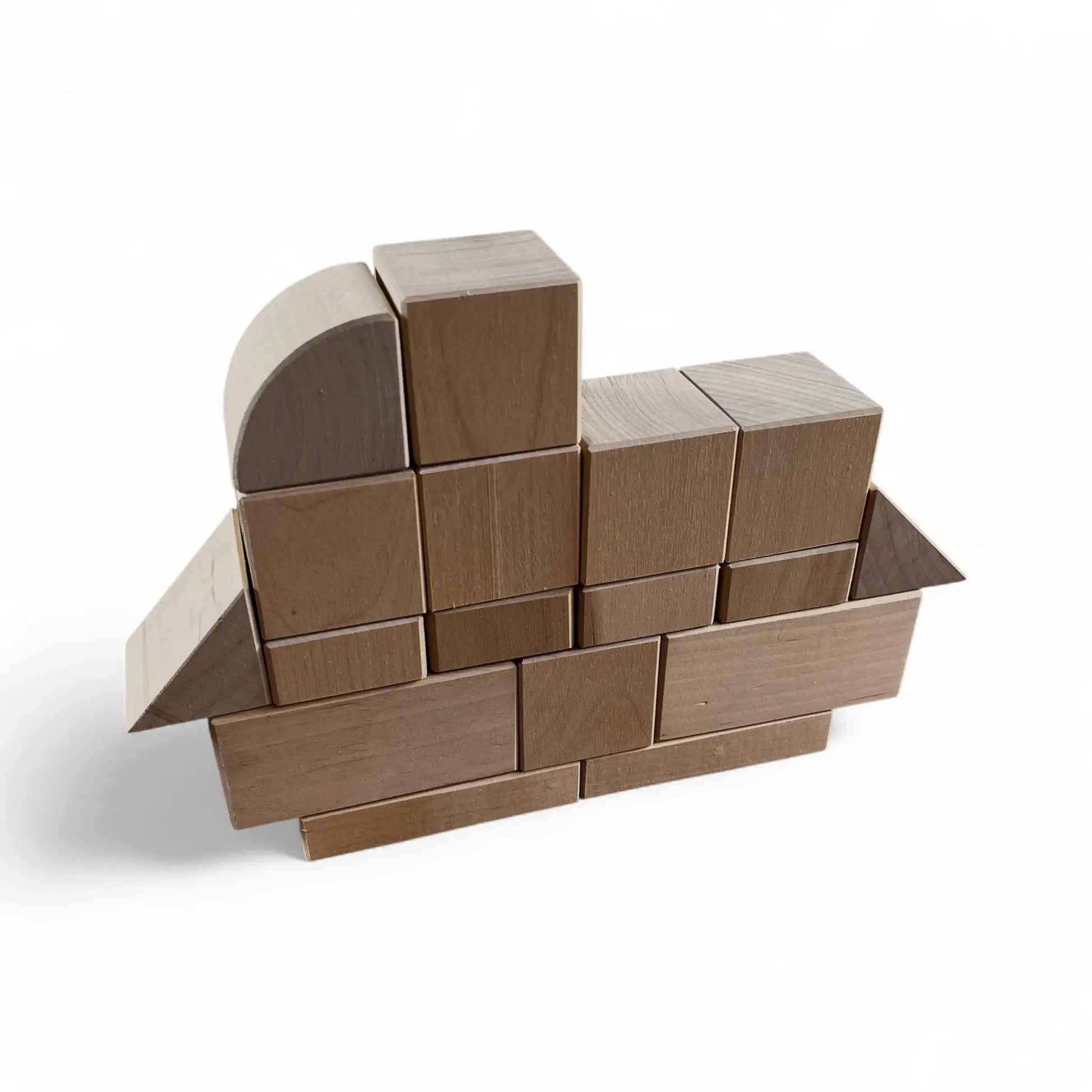 Wooden Toy Block Set – 31 Pieces arranged in a creative built structure, showcasing natural birch wood blocks.