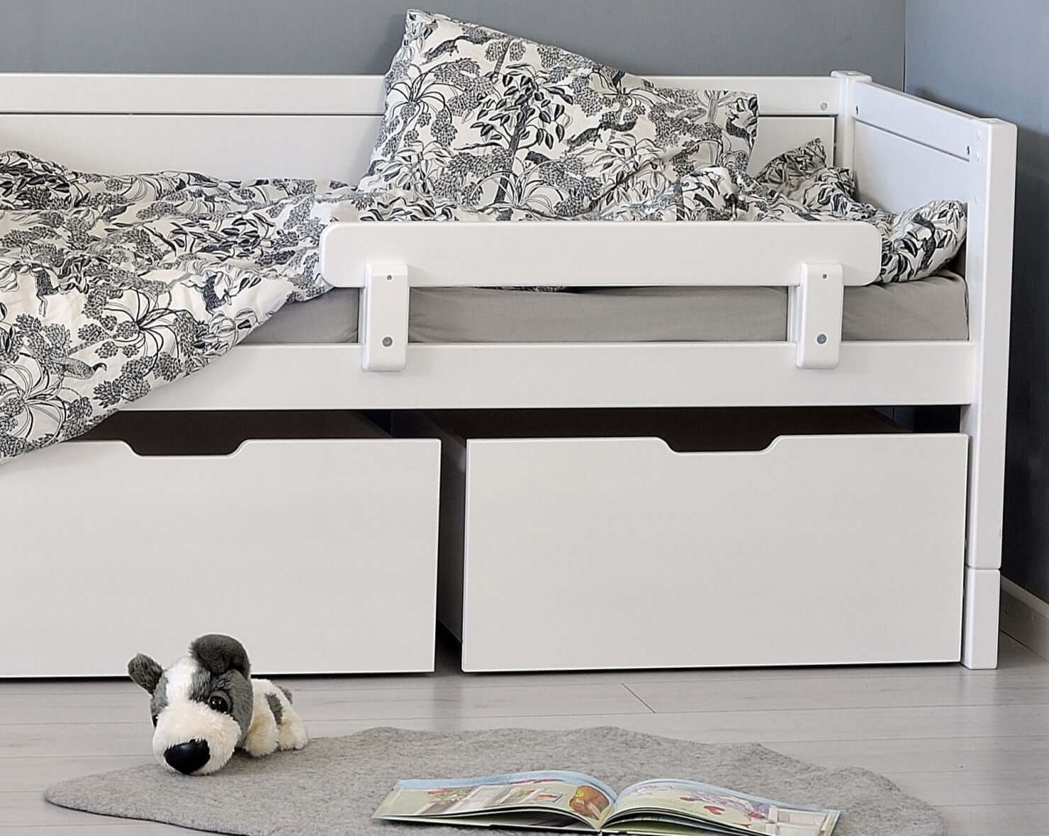 Jerwen - Compact bed - 70x160 cm featuring natural birch wood, storage drawers, safety barrier, and cozy bedding