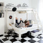 Two children enjoying their time on the Lahe - Family bunk bed - 90/140x200 cm - White in a stylish room.
