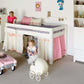 Lahe - Half high bed with slant ladder end mount - 90x200 cm - White in a stylish children's room.