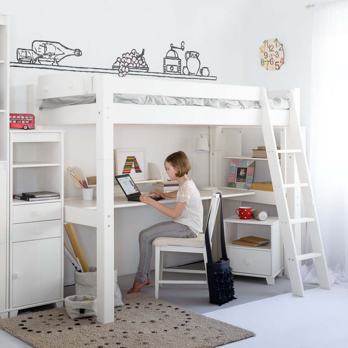 Lahe - High bed with slant ladder and table top - 90x200 cm - White in a stylish bedroom setting with a child studying.